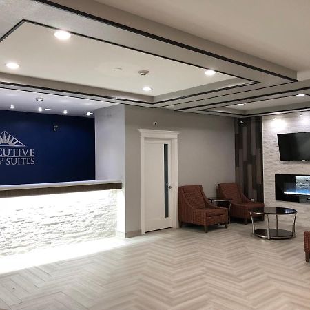 Executive Inn And Suites Joaquin Exteriér fotografie