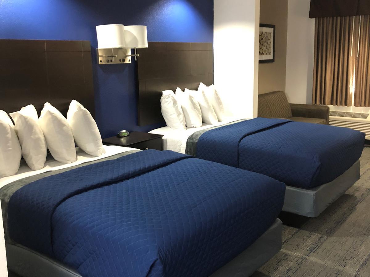 Executive Inn And Suites Joaquin Exteriér fotografie