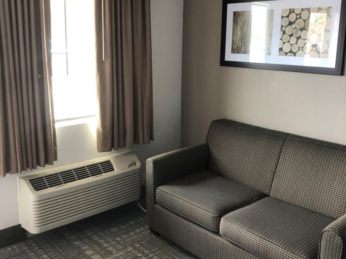 Executive Inn And Suites Joaquin Exteriér fotografie
